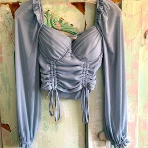 Light blue long sleeve top